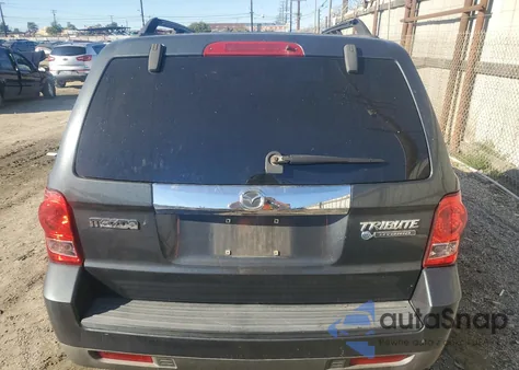 2009 Mazda Tribute Hybrid z USA, uszkodzony, nr VIN 4F2CZ49319KM07138